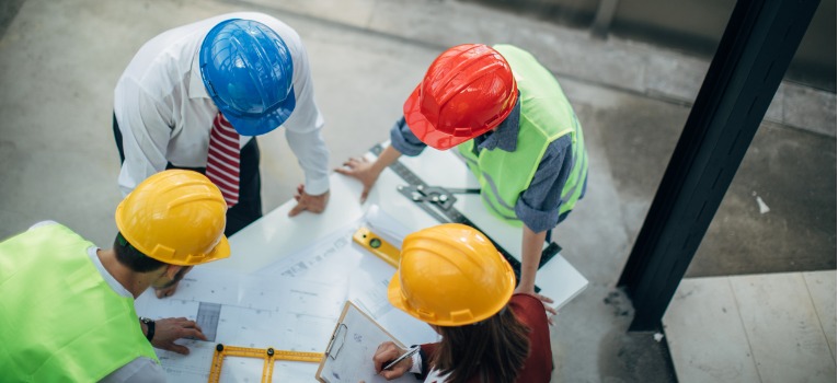 Builders in hard hats