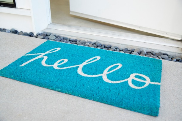 Doormat and open door